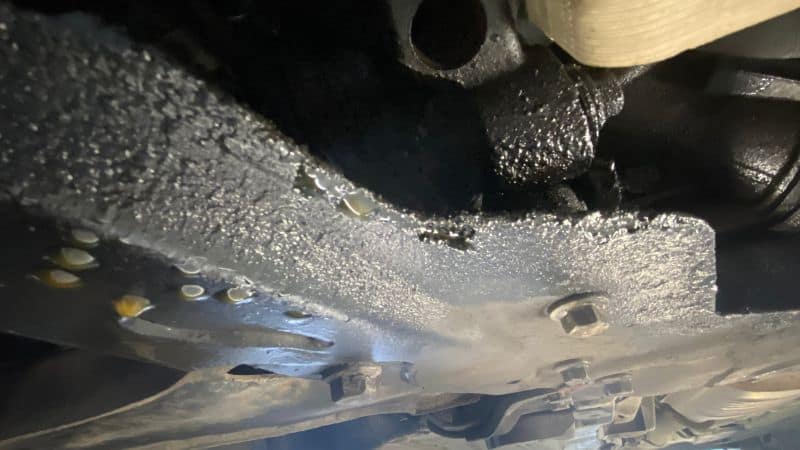 spilled oil on engine when filling
